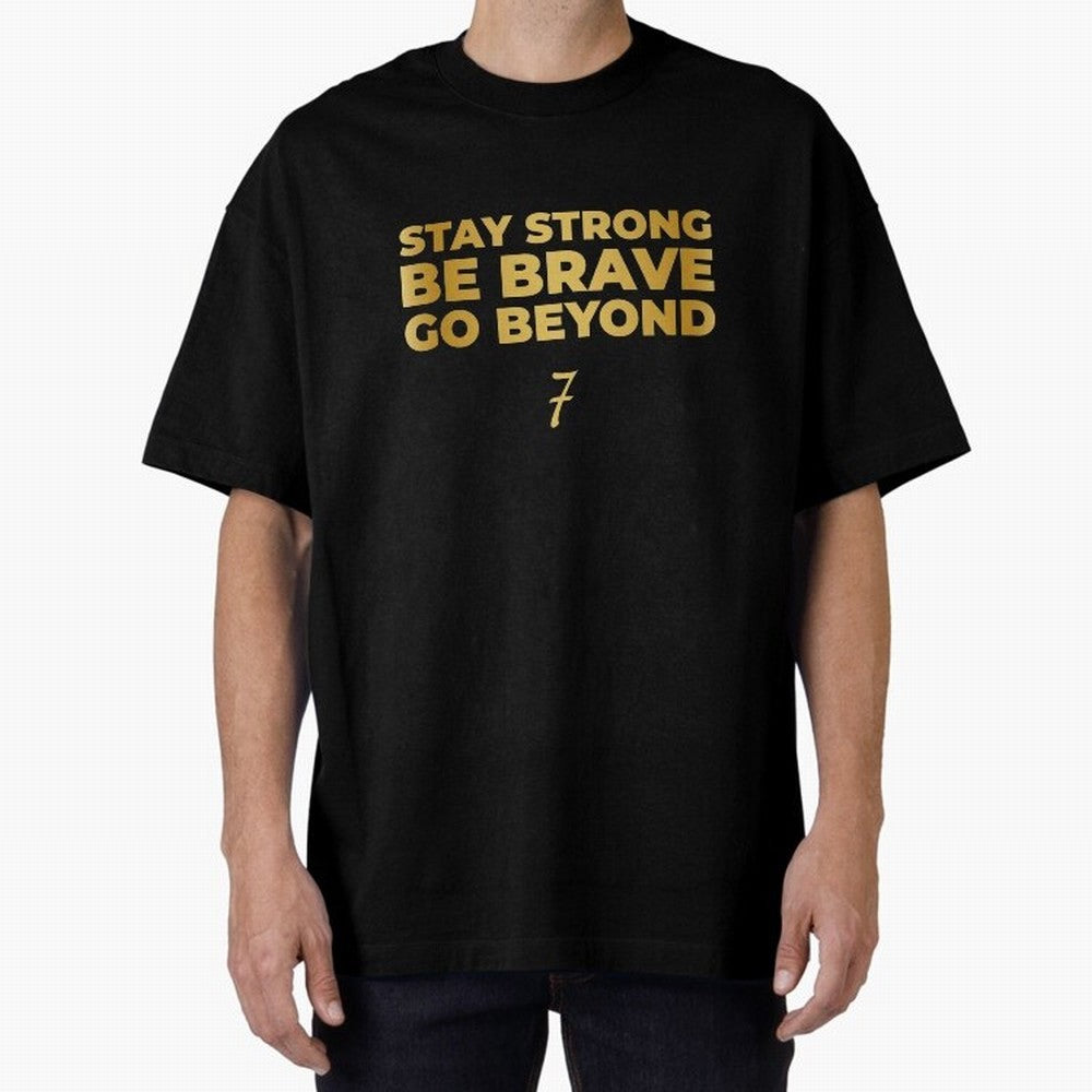 Stay Strong, Be Brave, Go Beyond (Gold Edition) Oversized T-Shirt Live the Energy of the FIFA World Cup 2026 Group Stage Journey through Cristiano Ronaldo Highlights, Spain Pride, Fan Favorite Moments, National Team Passion, Big Match Drama and