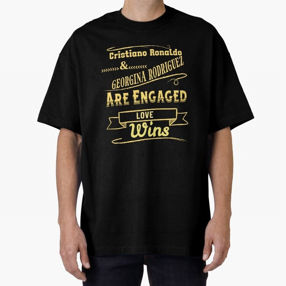Cristiano & Georgina Engagement ¨C True Love Story Oversized T-Shirt Support FIFA World Cup 2026 Group Stage Spirit, Featuring Argentina, France and Brazil, Messi and Cristiano Ronaldo, Retro Football Energy, Iconic Rivalries, Trophy Chase Drama