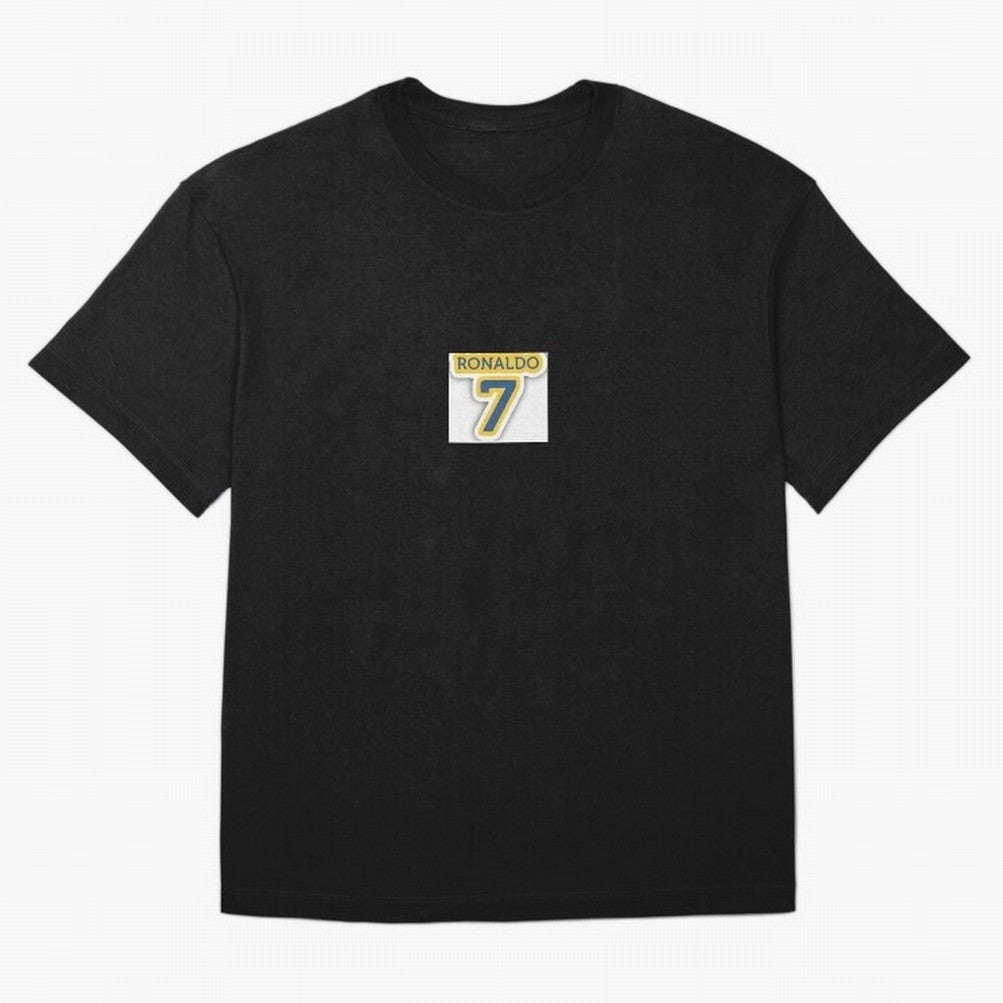 Ronaldo sticker Oversized T-Shirt Celebrate Golden Goal Energy in FIFA World Cup 2026 Group Stage Centered on Messi, CR7 and Mbappe, France and Portugal Energy, Retro Football Energy, Iconic Rivalries, Trophy Chase Drama and Stadium Atmosphere;