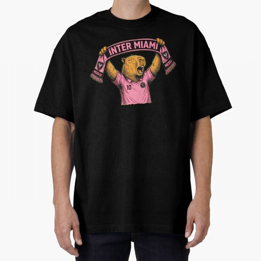 Capybara Inter Miami Fan Celebrating ¨C Funny Soccer Illustration with Scarf Oversized T-Shirt Show Your Love for FIFA World Cup 2026 USA Canada Mexico Highlighting CR7 and Messi, Argentina and Brazil Energy, Football Festival Excitement, Trophy